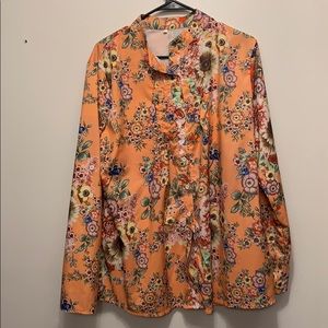 Orange long sleeve shirt covered with flowers